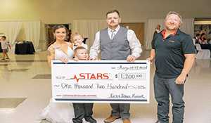 STARS thanked with donation at wedding